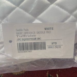 New TuffRider dressage saddle pad. Never used or taken out of plastic covering!
